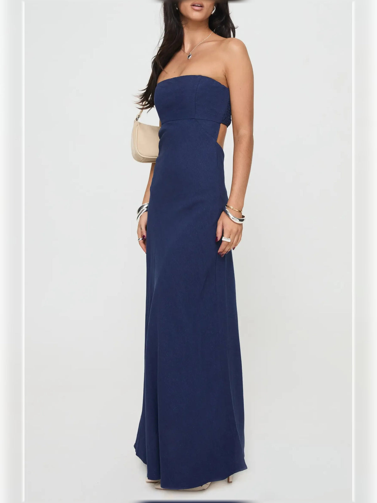 Navy strapless sheath formal dress with cutout, floor-length, side view