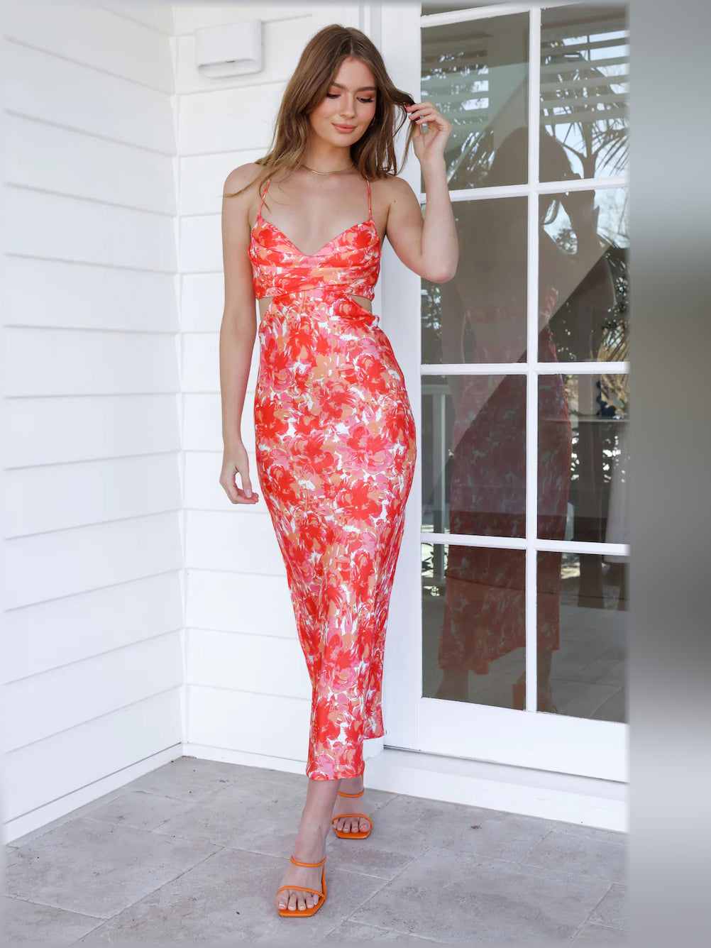 Orange and red floral midi formal dress with spaghetti straps and straight body-hugging cut
