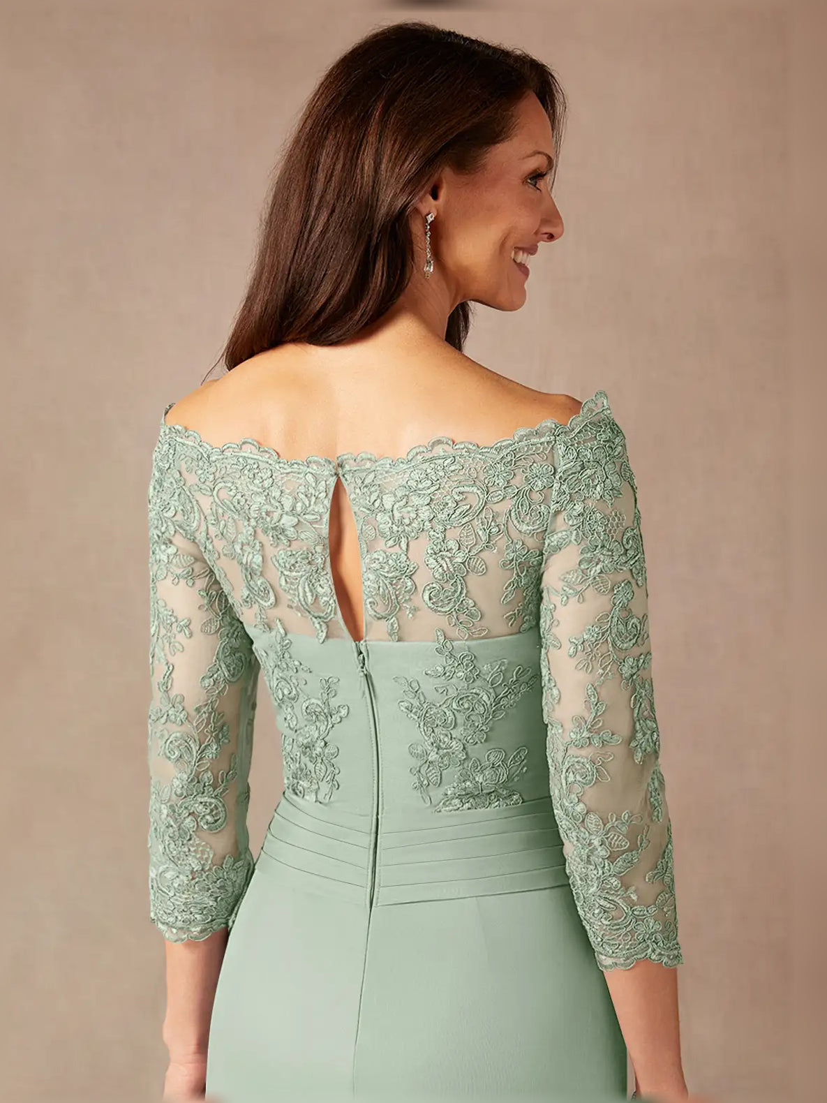 Dusty sage off-shoulder ruched maxi dress back view with lace sleeves and central seam
