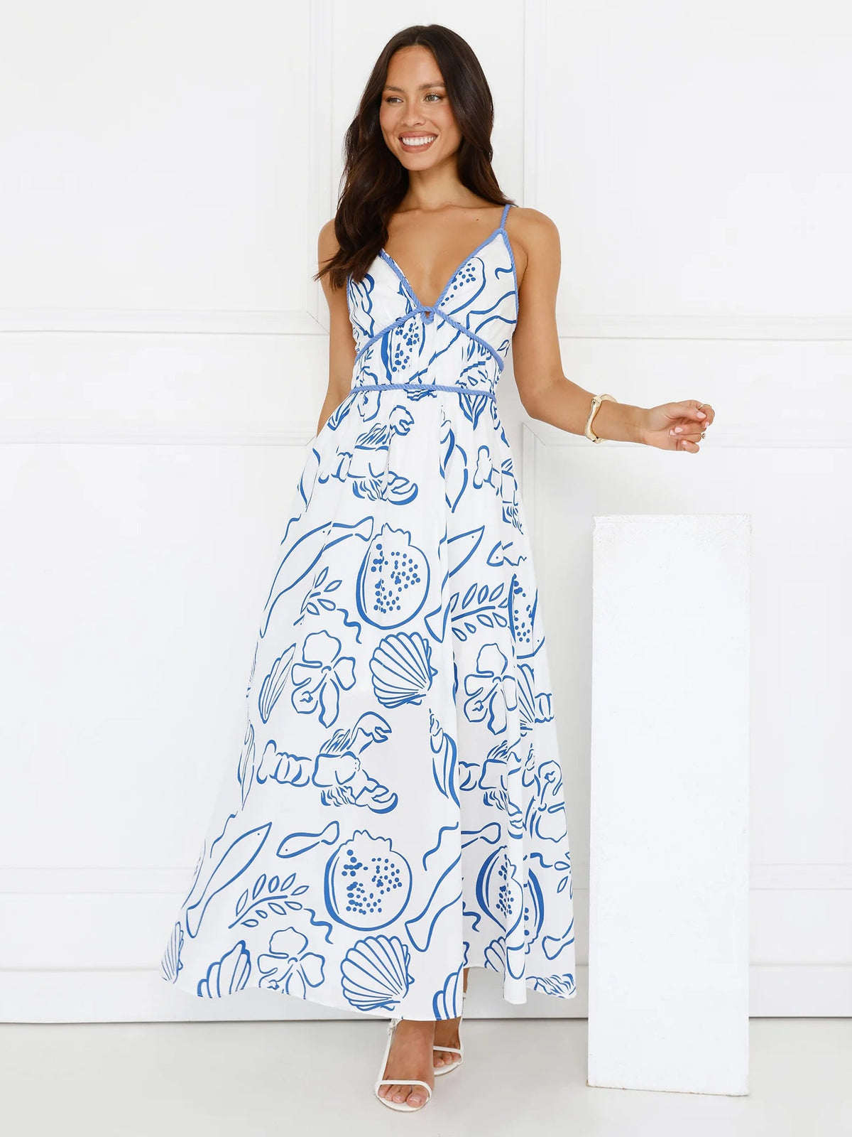 White a-line maxi formal dress with floral print, alternate view showing the waist