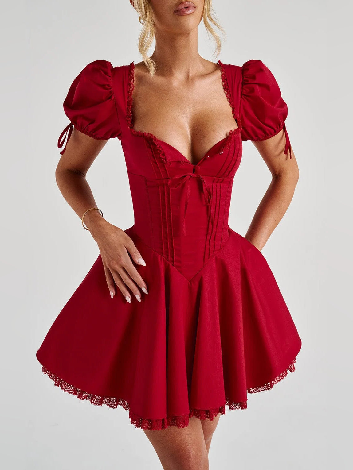 Red mini dress with square neckline, lace-trim bust, puff sleeves, flared skirt