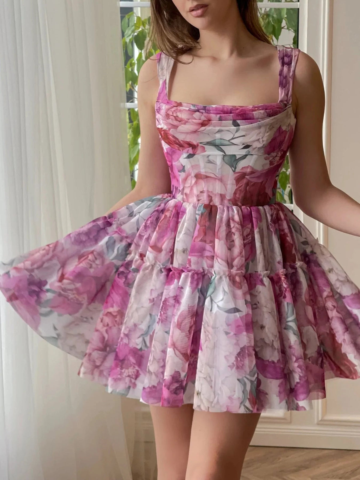 Floral chiffon mini dress with square neckline and tiered A-line skirt, sleeveless