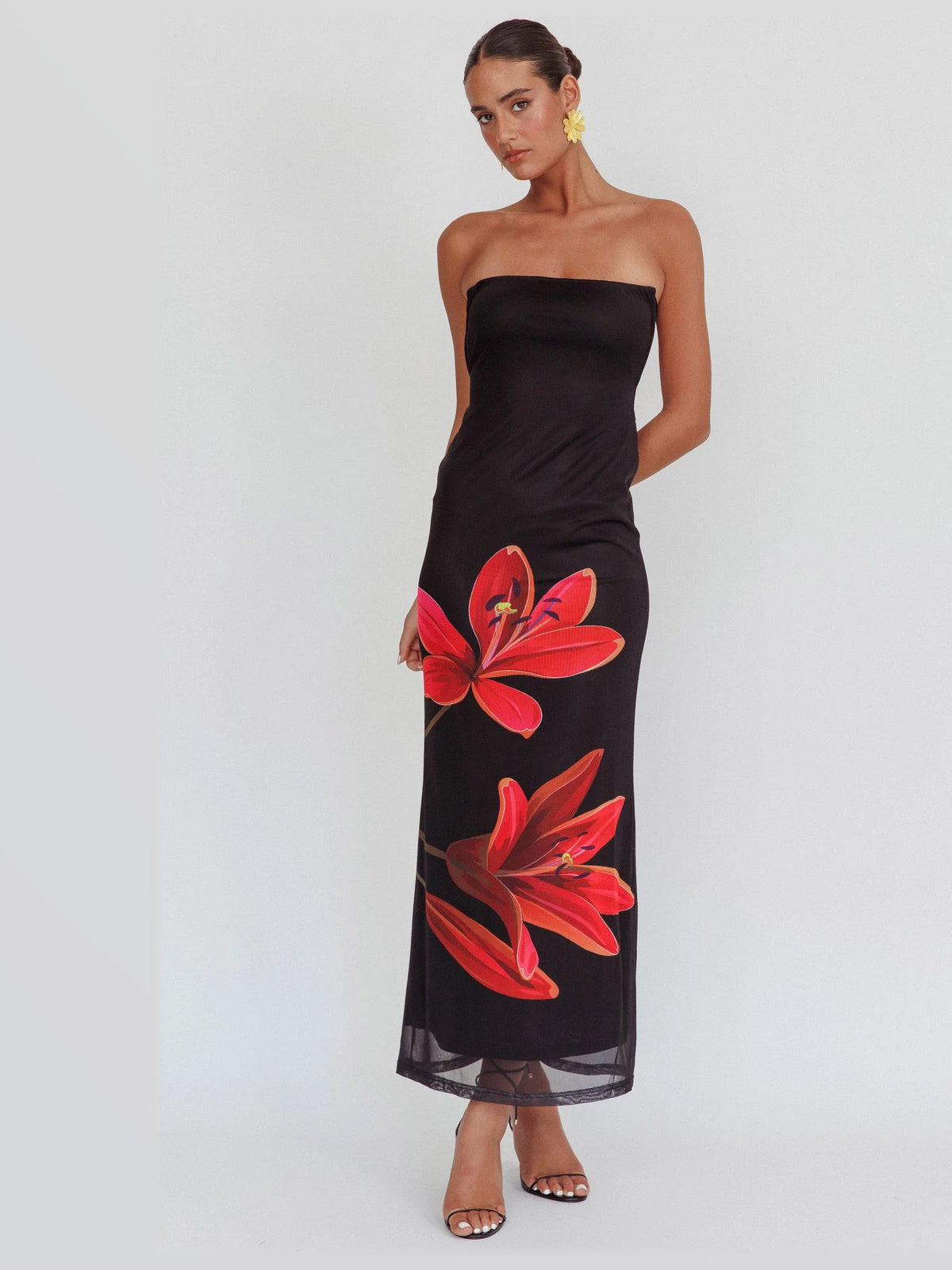 Black maxi formal dress, alternate full-length view showing the skirt