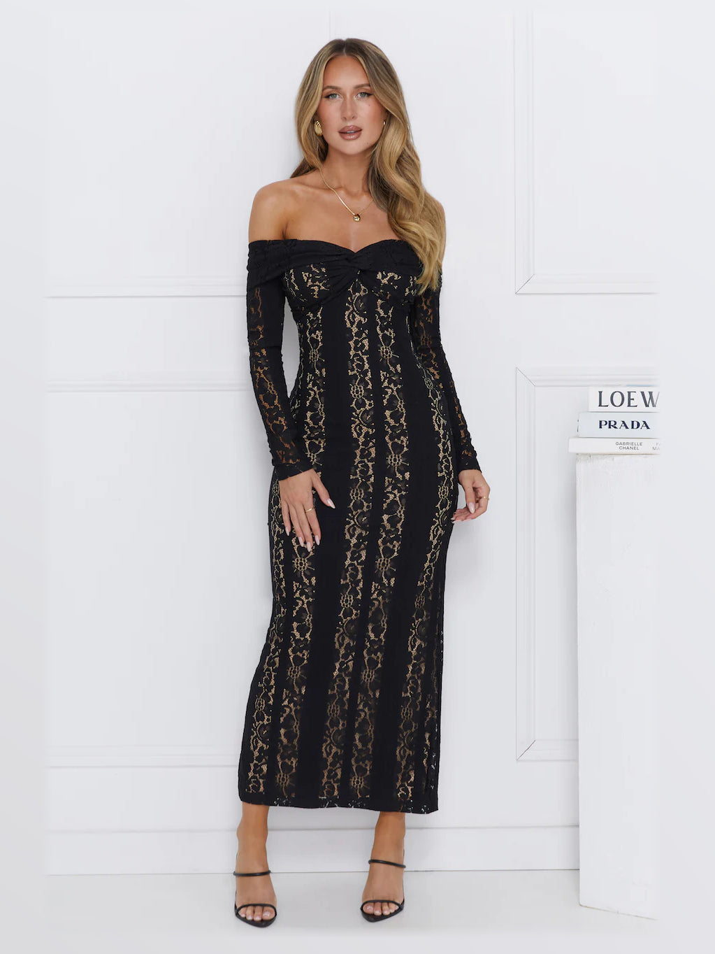Black midi formal dress, alternate full-length view showing the skirt
