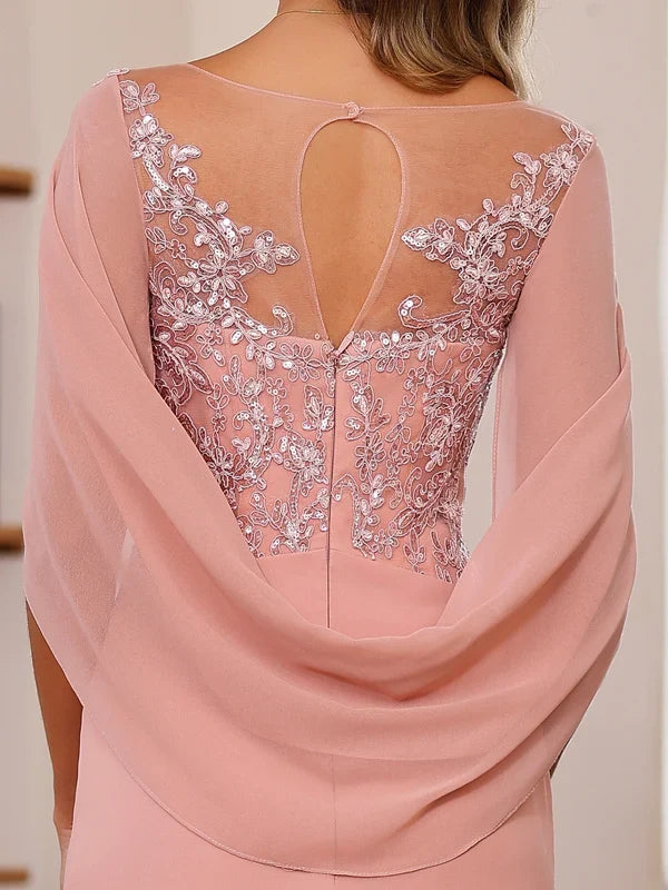Dusty pink chiffon sheath dress with sheer cape sleeves, lace back, and keyhole opening