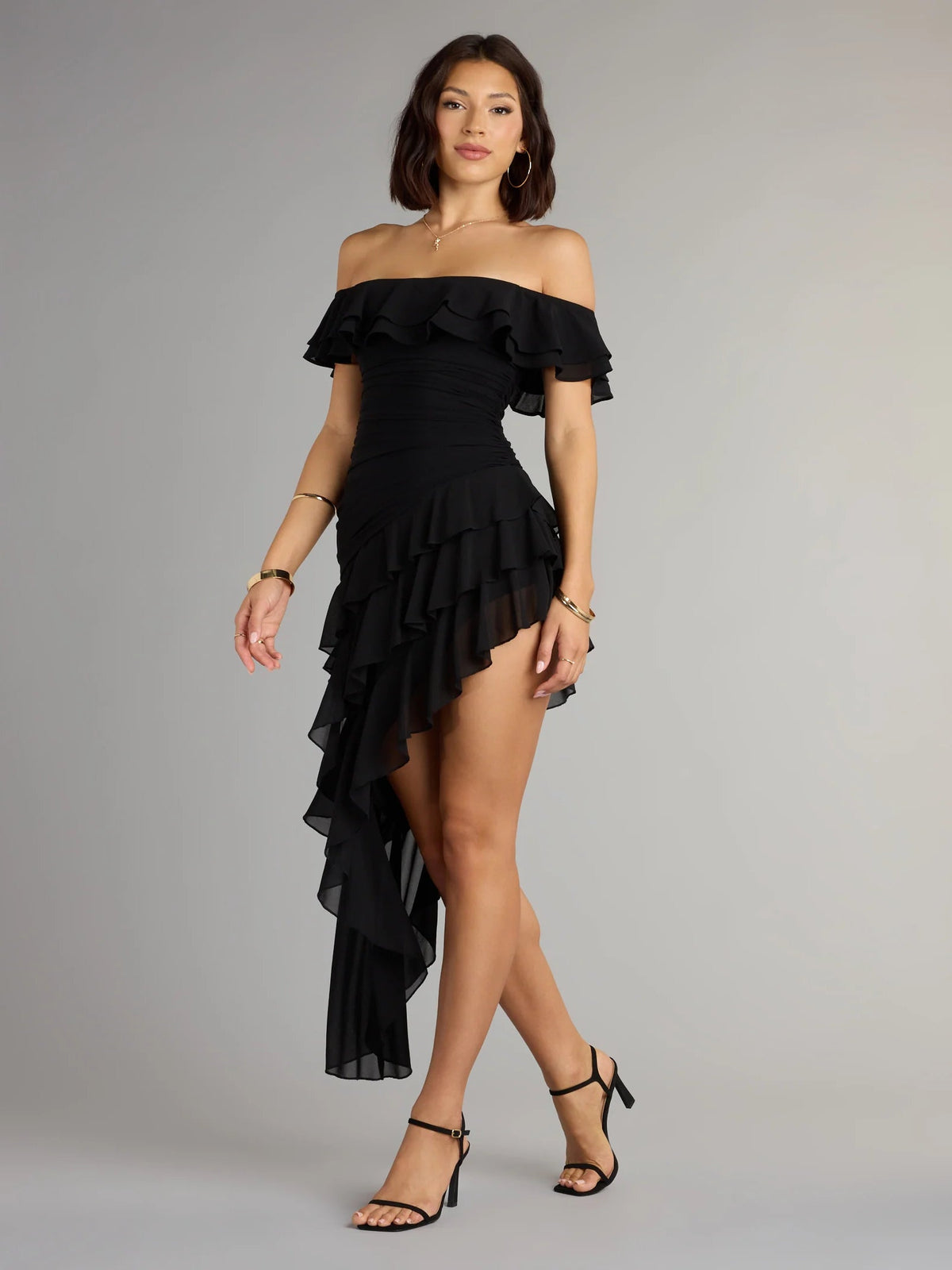 Black off-shoulder ruffled mini chiffon dress with cascading layered skirt