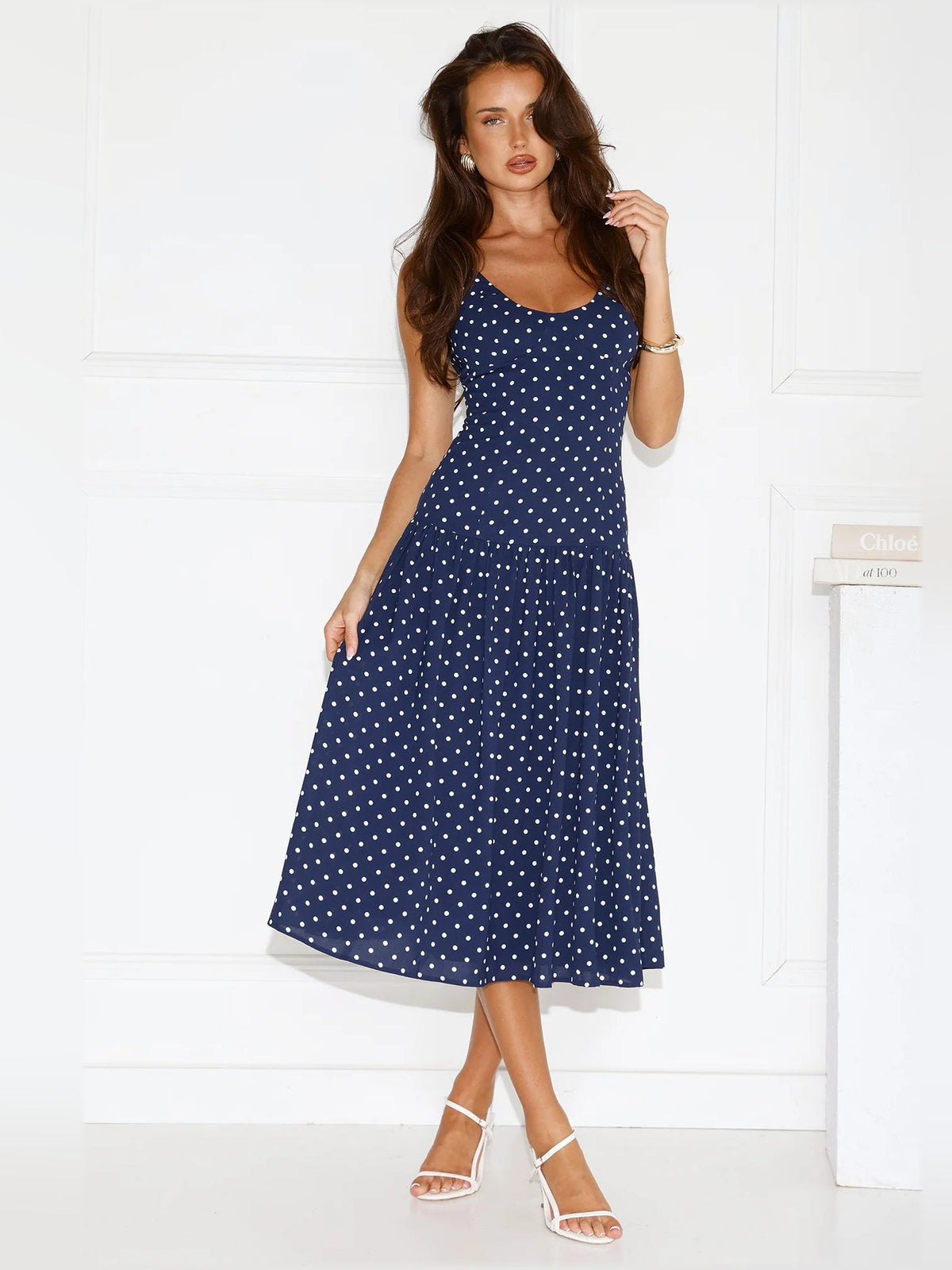 Navy polka dot midi formal dress, sleeveless with scoop neck and pleated skirt