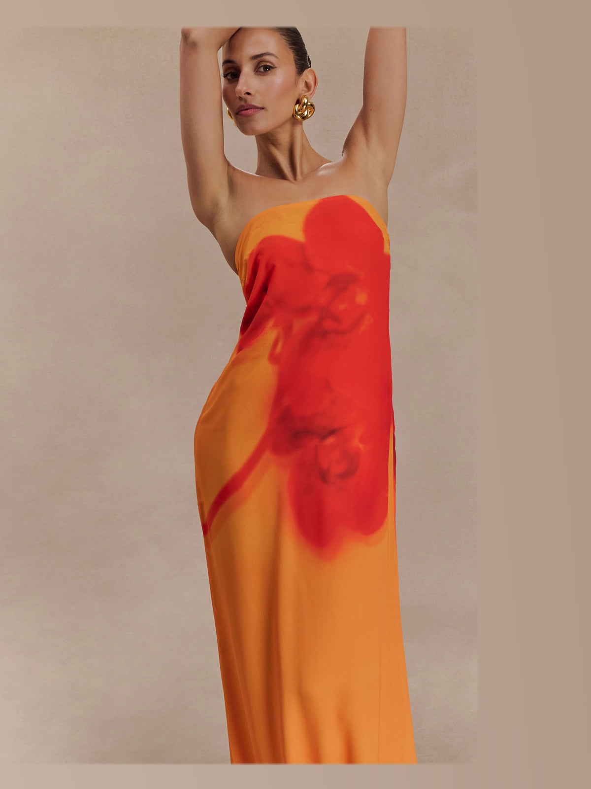 Orange formal dress with a-line detailing