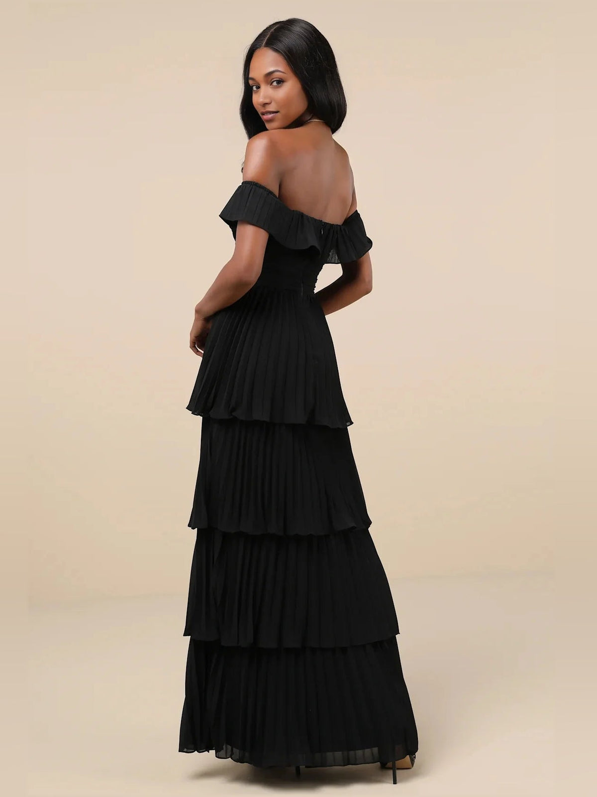 Off-shoulder tiered A-line maxi dress in black with layered ruffles on skirt