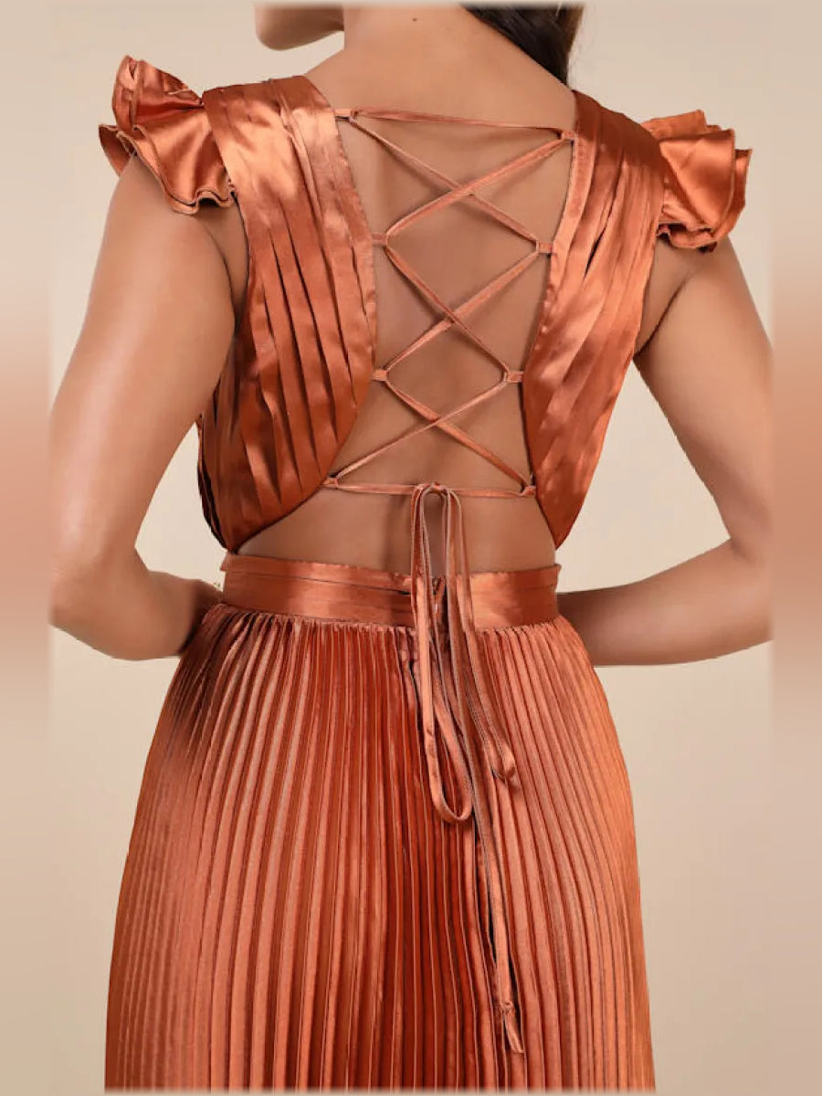 Burnt orange pleated dress bodice with crisscross back straps and tie, short sleeves