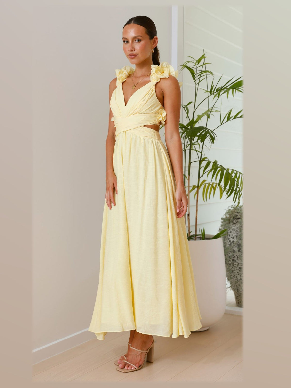 Yellow maxi formal dress, alternate full-length view showing the skirt