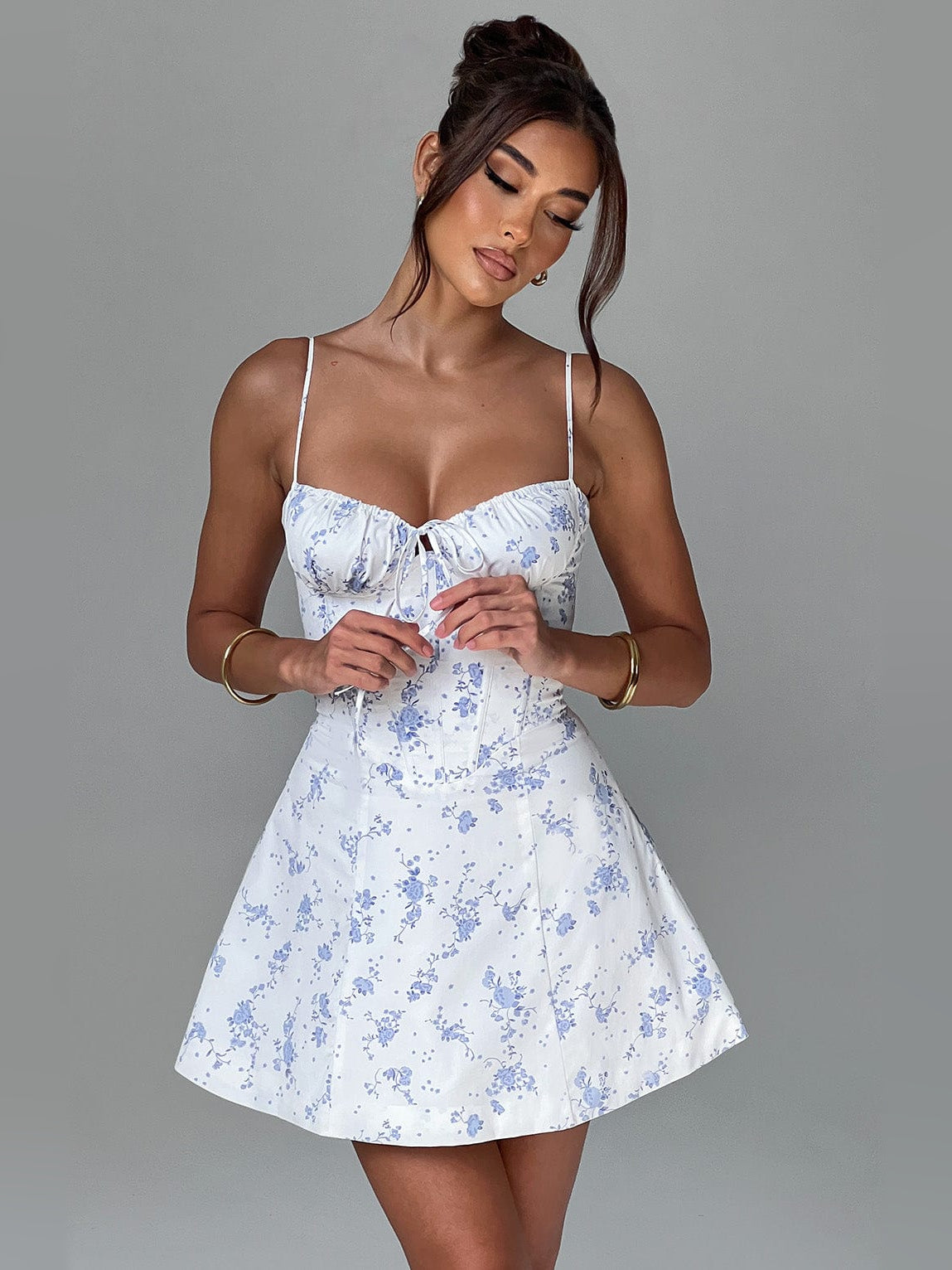 Floral print mini dress with fitted bodice and gathered waist