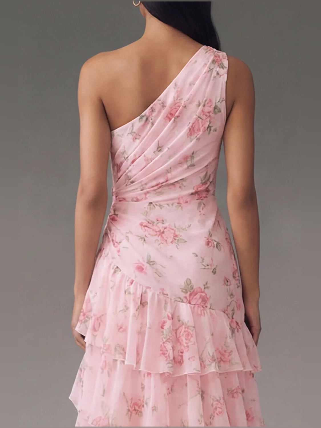 Light pink floral one-shoulder maxi chiffon dress with open back and tiered ruffle hem