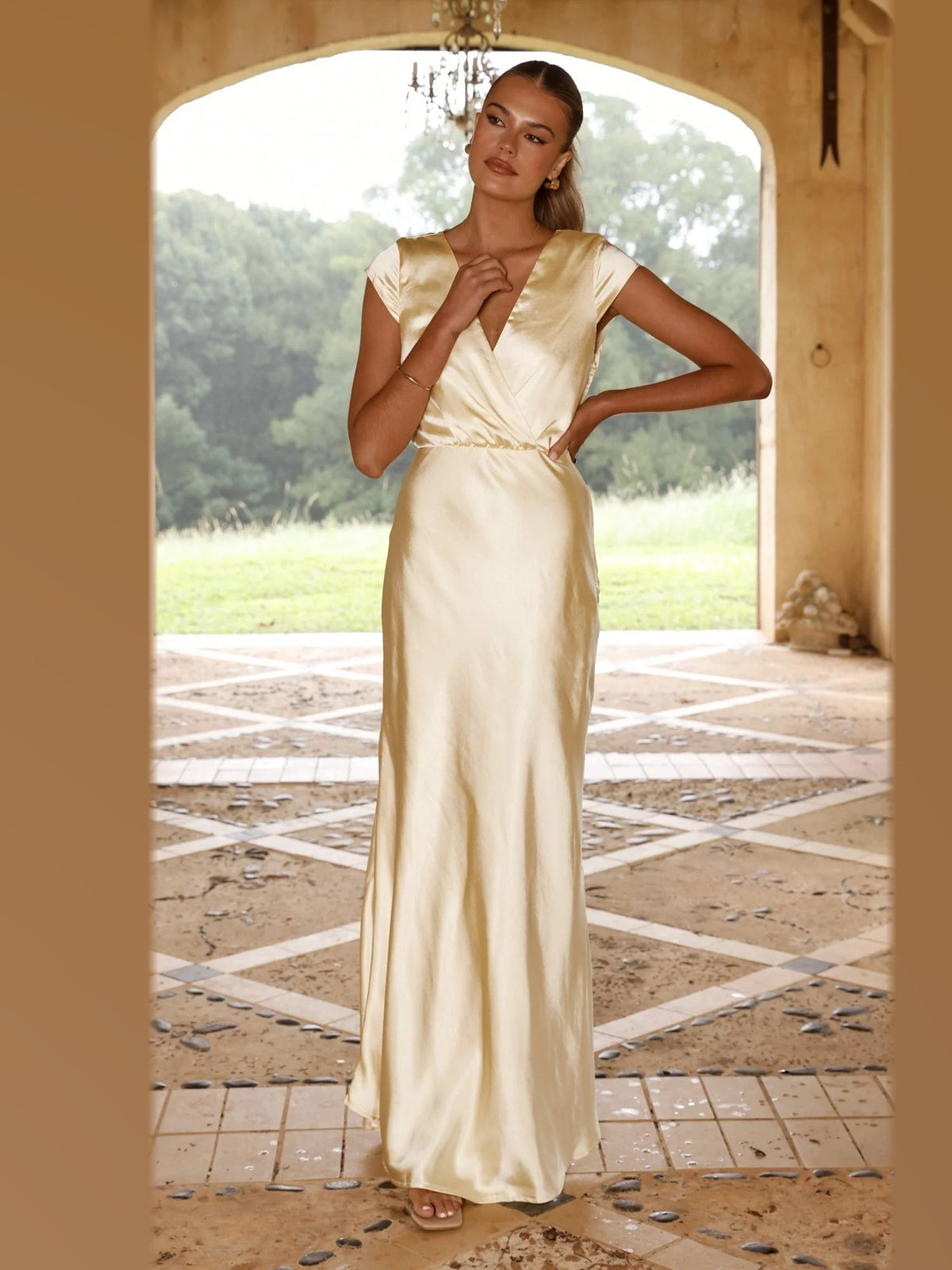 Yellow maxi formal dress, alternate full-length view showing the skirt