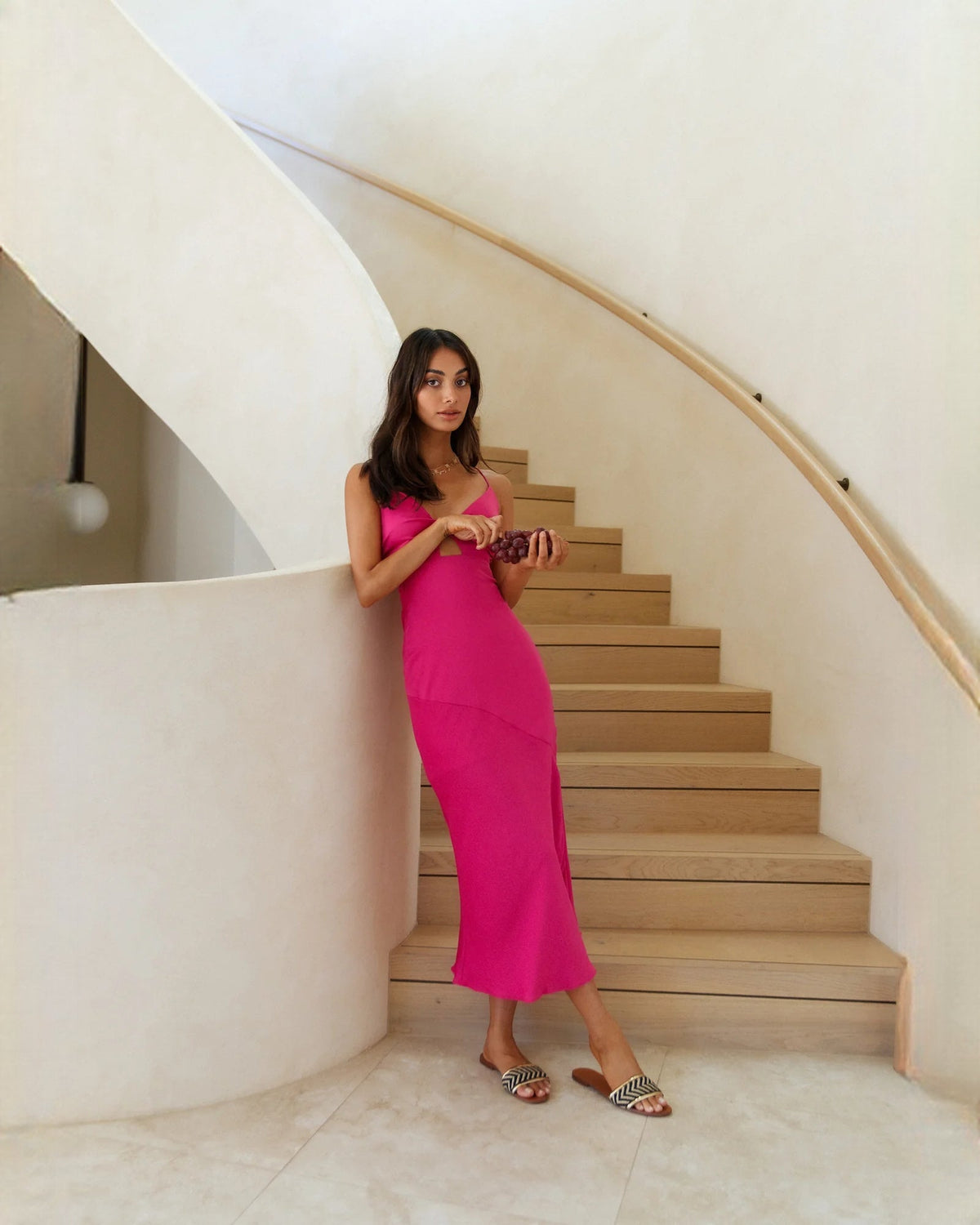 Pink sleeveless satin A-line maxi dress with keyhole neckline and draped waist seam