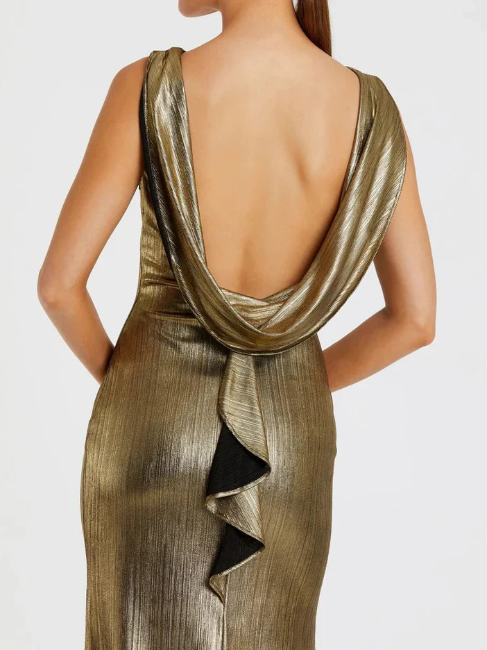Gold sleeveless mermaid dress close-up of open-back draped cowl and ruffle detail