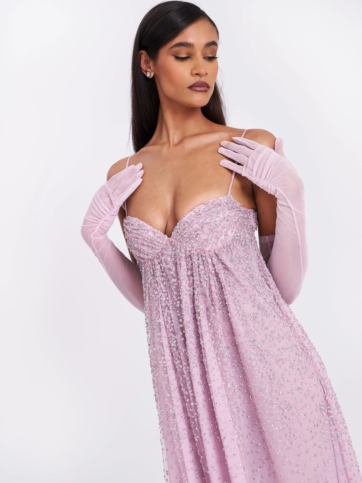 Dusty rose beaded sweetheart prom dress bodice with thin straps and draped gathered detail