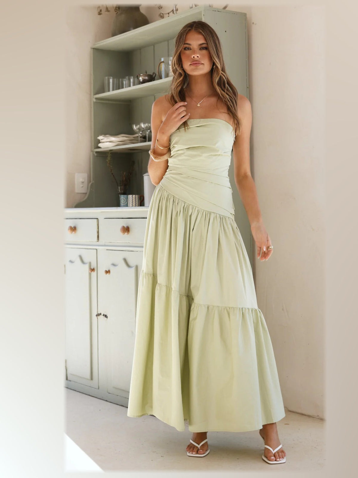 Sage midi formal dress, alternate full-length view showing the skirt