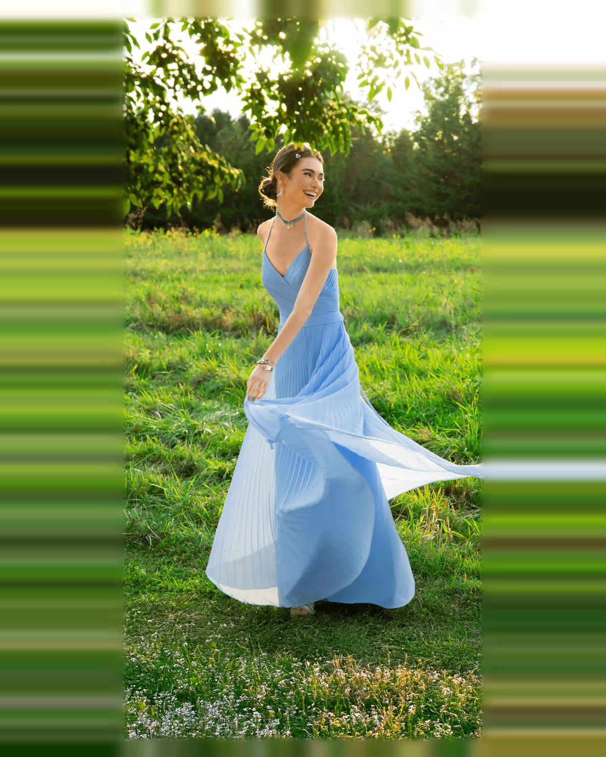 Light blue pleated A-line floor-length prom dress with V-neck and halter straps