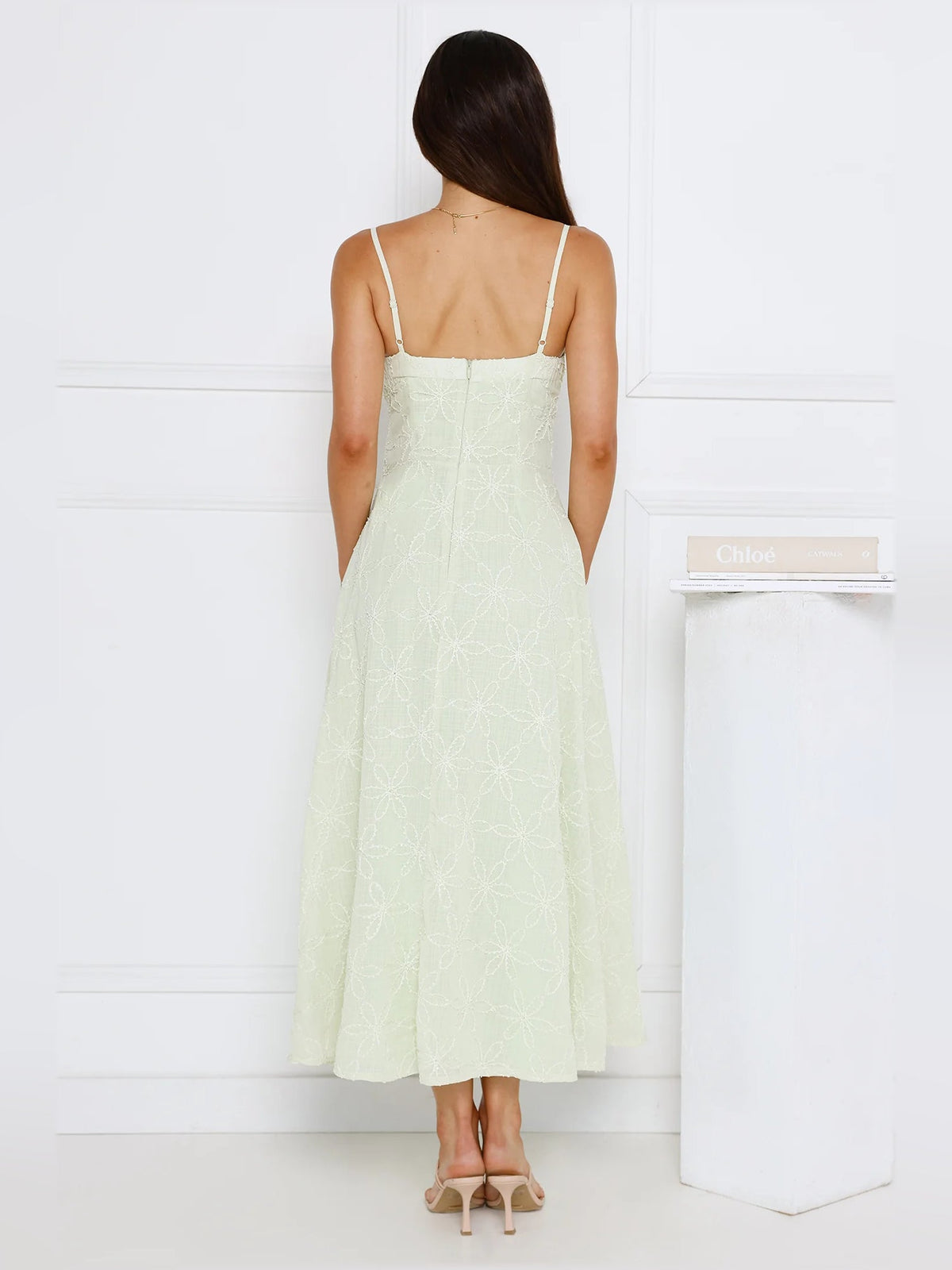 Mint midi formal dress, back view; open back with thin spaghetti straps