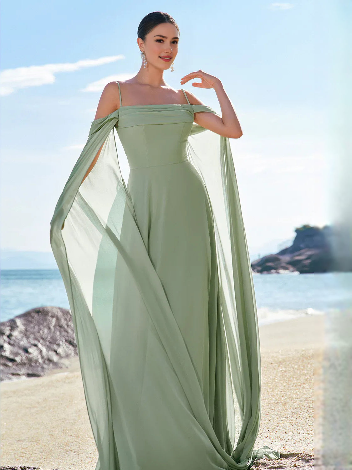 Dusty sage off-shoulder A-line chiffon bridesmaid dress with flowing cape sleeves