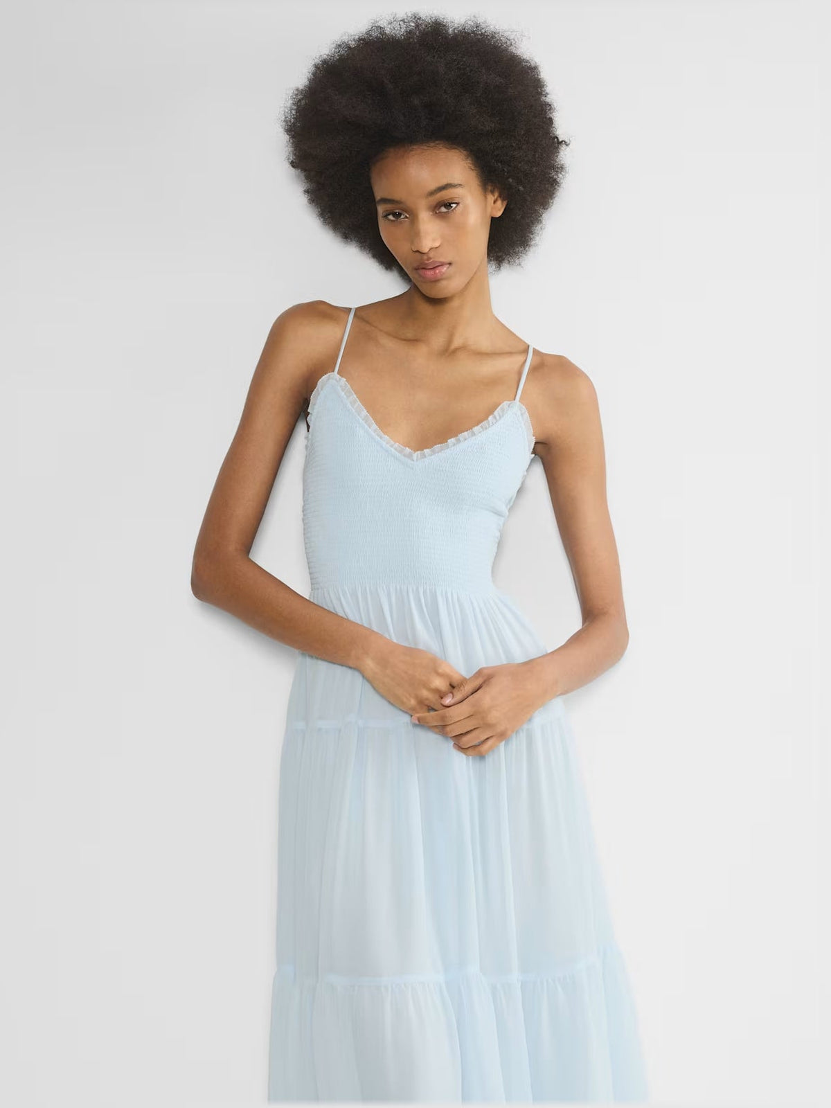 Light blue chiffon midi dress with scalloped V neckline and spaghetti straps