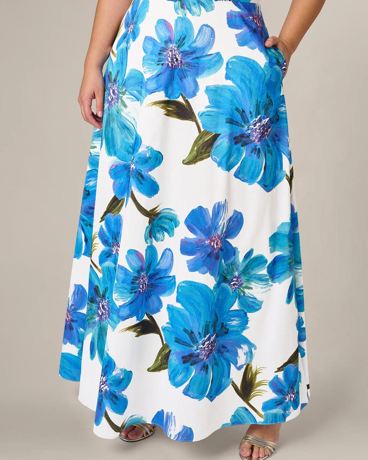 Blue and ivory strapless A-line maxi dress with large floral pattern and draped bodice