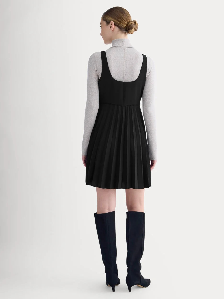 Black sleeveless mini dress, scoop back with pleated skirt