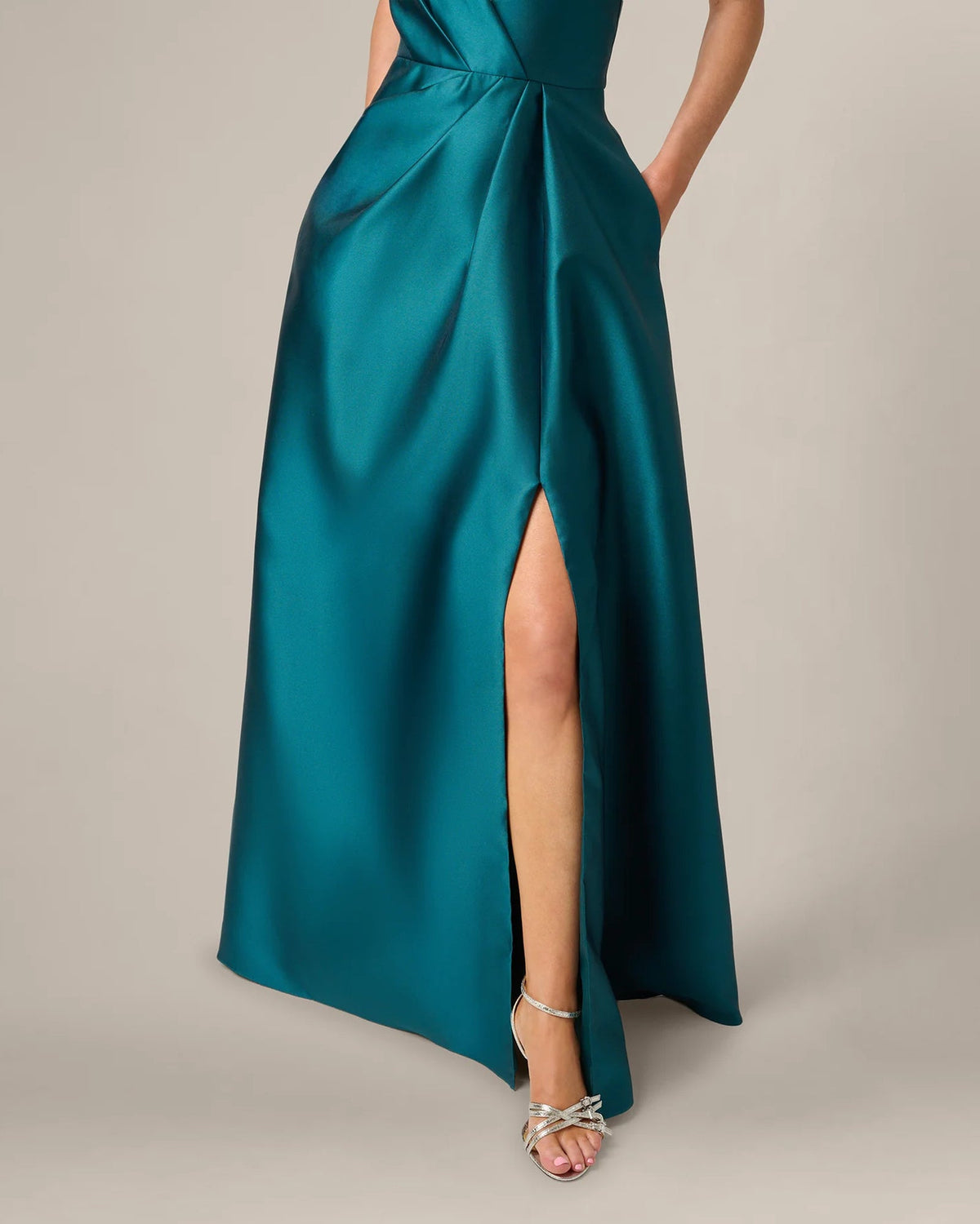 Teal one-shoulder pleated A-line maxi dress with front side slit and gathered waist.