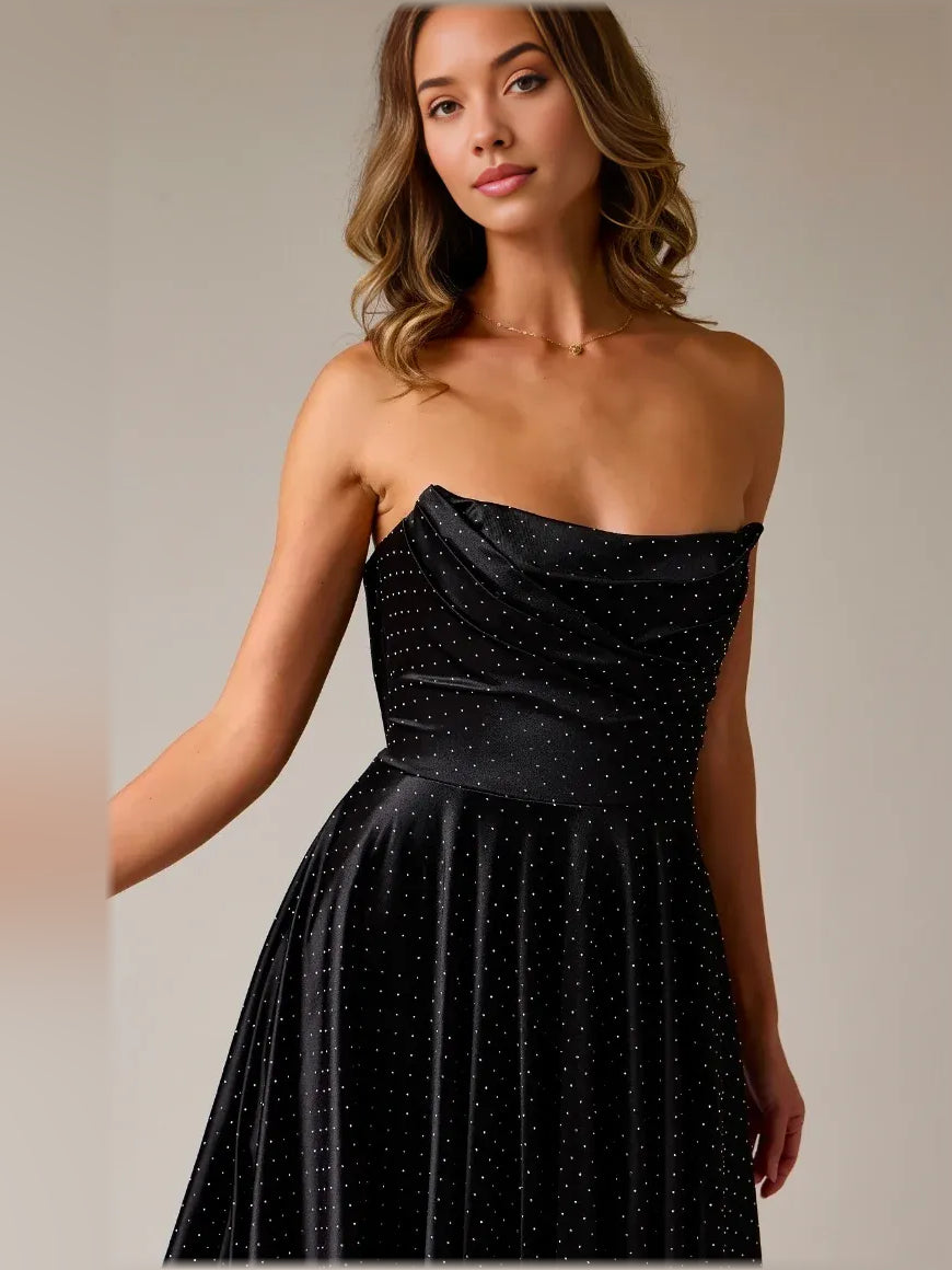 Black strapless satin bodice with textured dotted pattern and fitted waist
