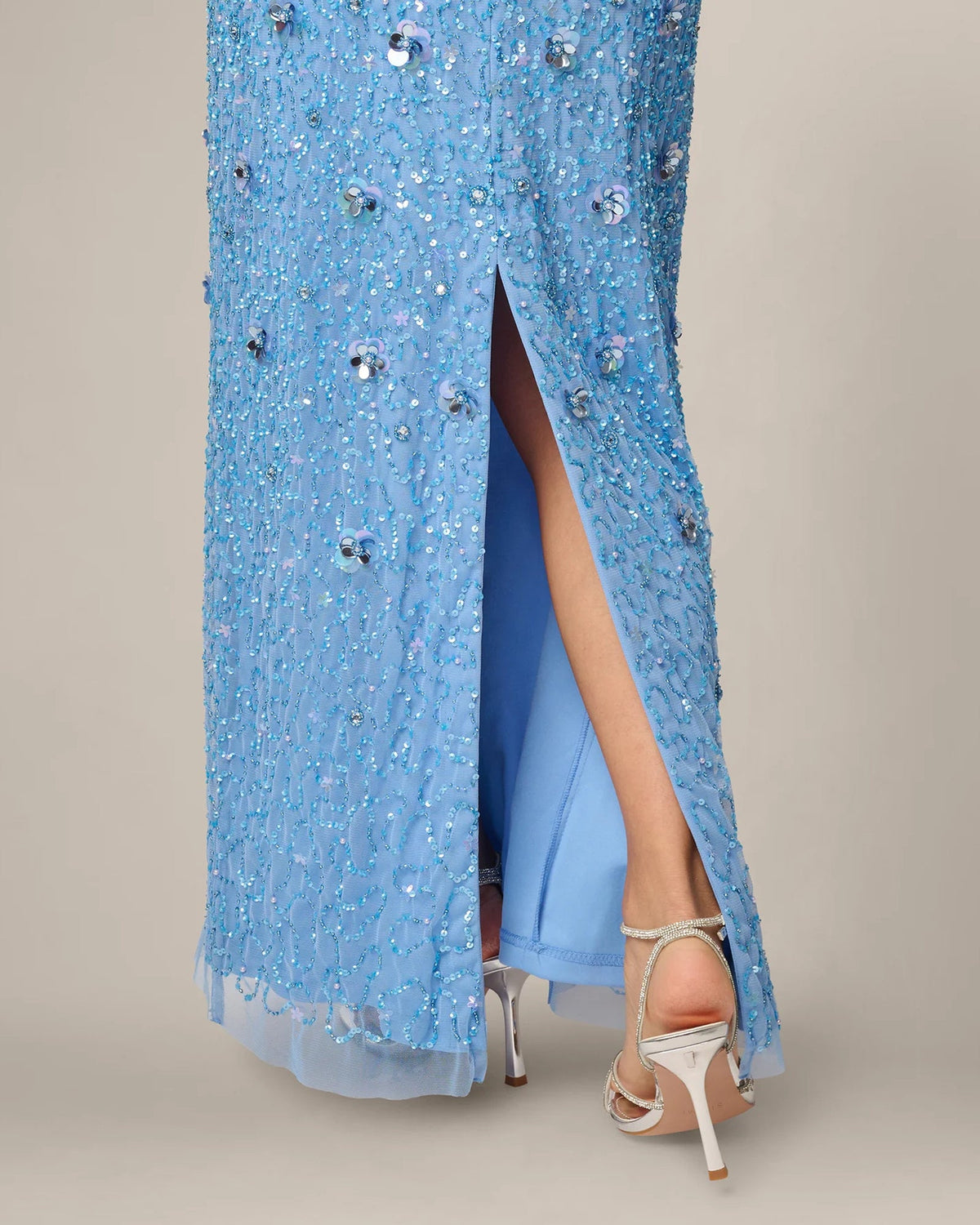 Light blue embellished maxi dress with front slit and short sleeves, long A-line hem