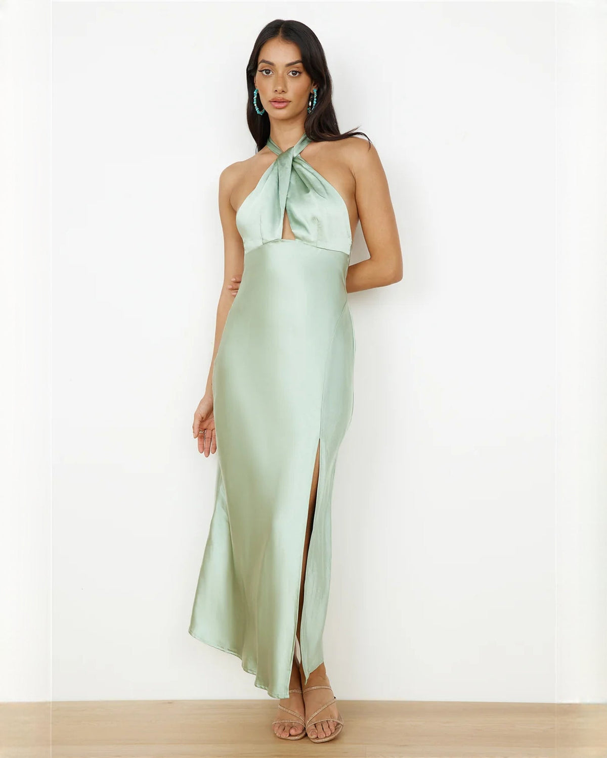 Mint green satin halter maxi dress with side slit hem and draped halter neckline