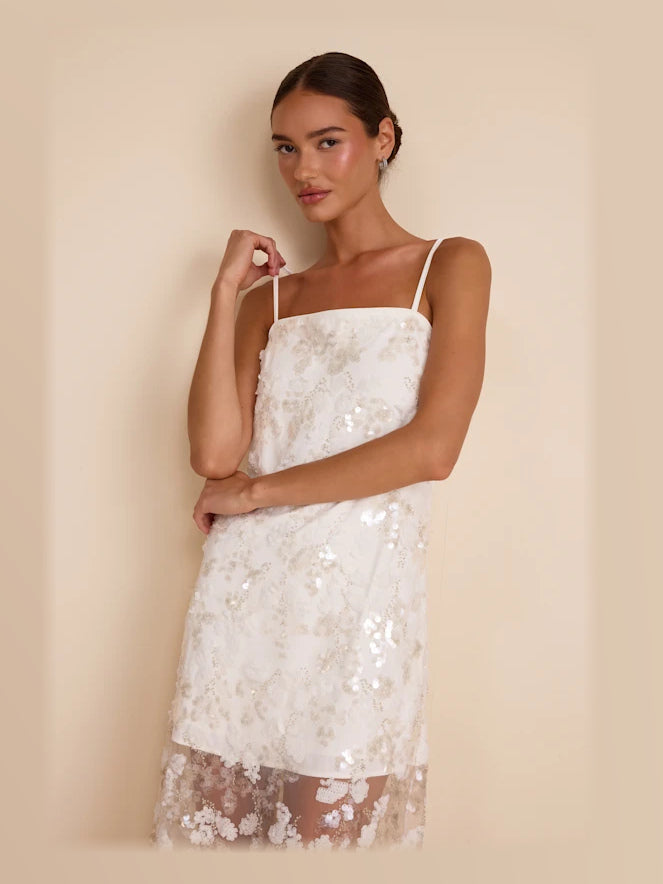 White formal dress with embroidered detailing