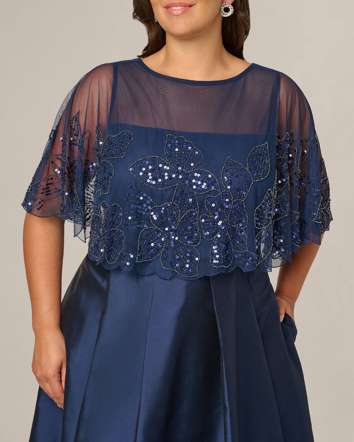 Light navy dress bodice with sheer overlay and floral sequin beadwork