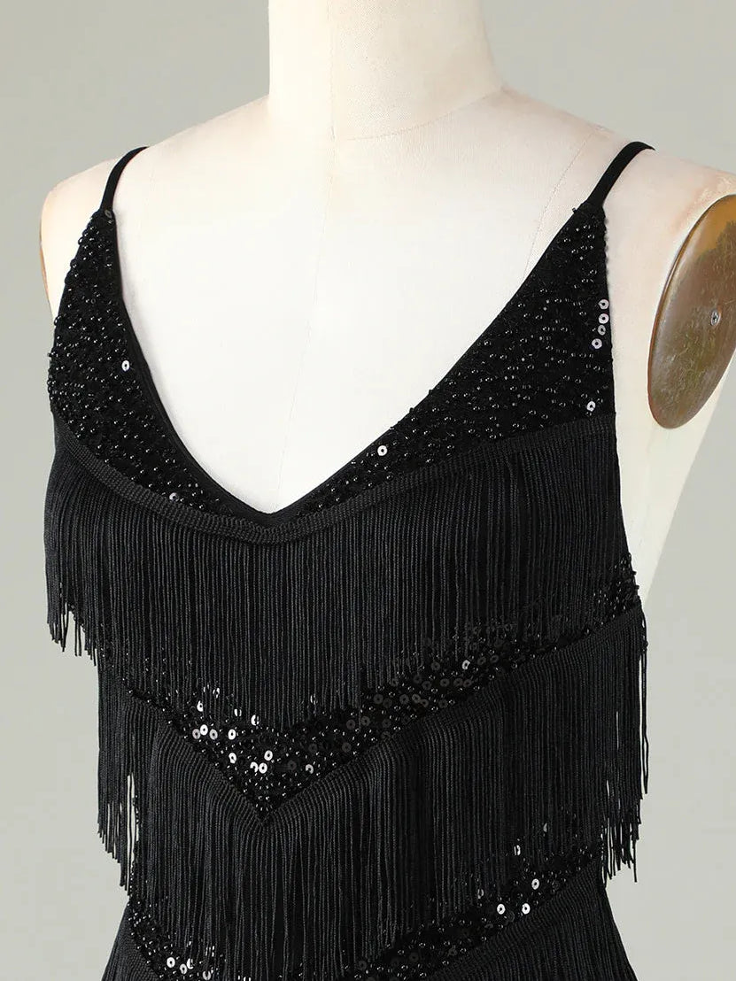 Black V-neck sequined mini dress with layered fringe trim and dotted accents