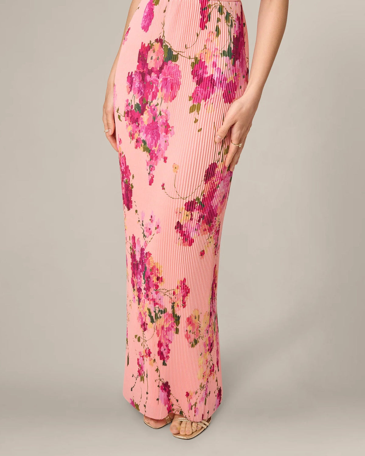 Pink floral maxi dress with gathered waist seam and flowing A-line skirt