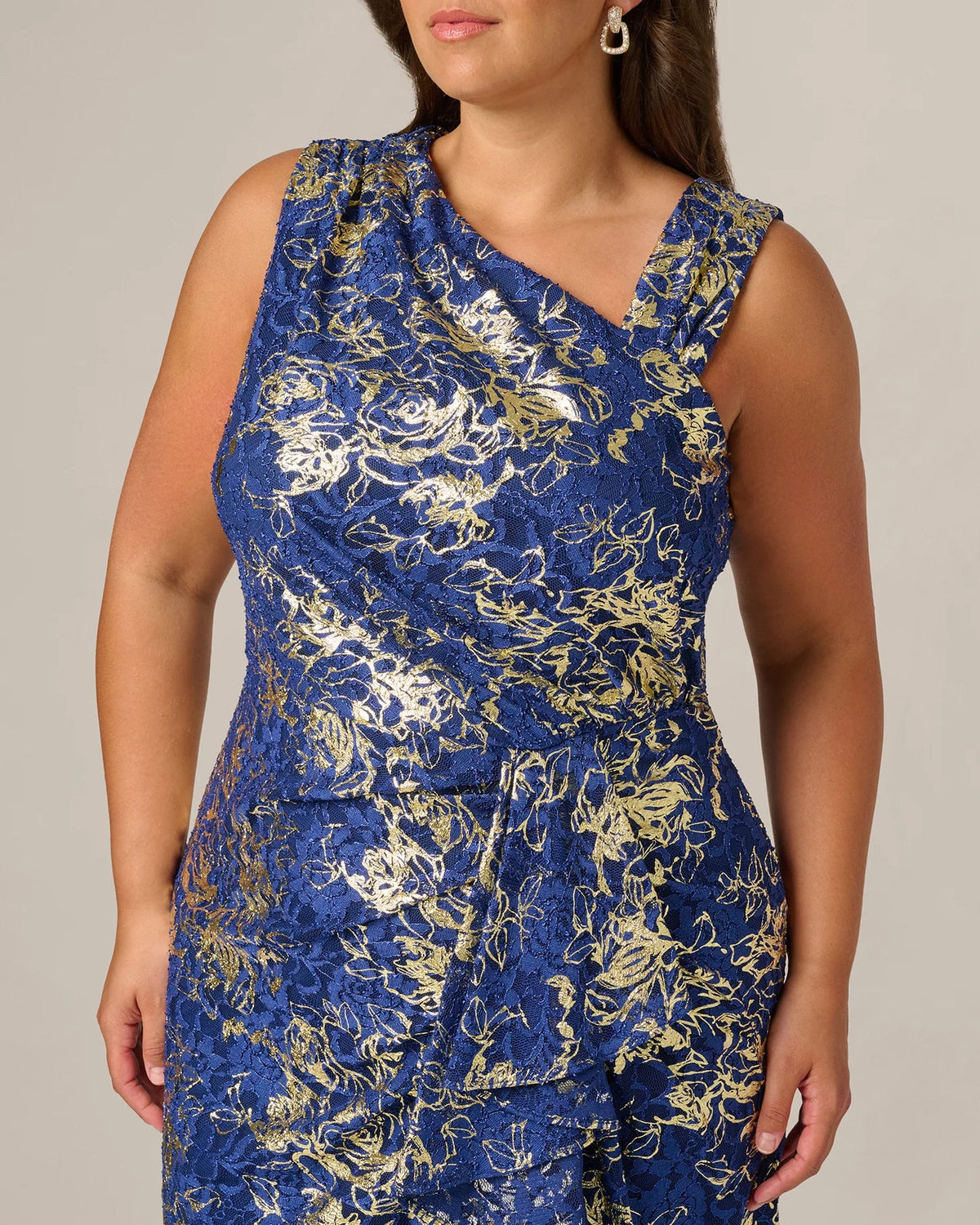 Sleeveless draped neckline maxi dress in blue with ornate gold floral lace bodice