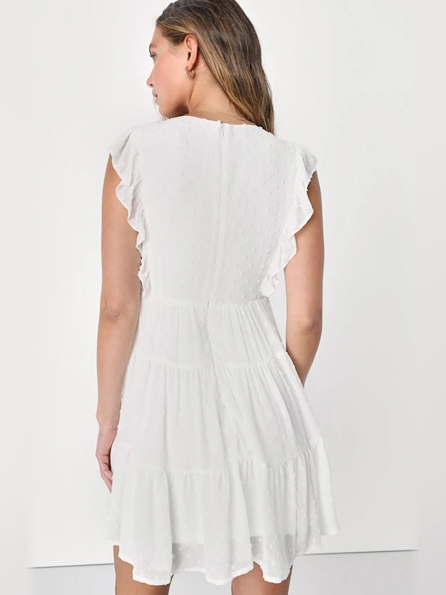 White tiered mini dress, ruffle-trim shoulders and tiered back hem