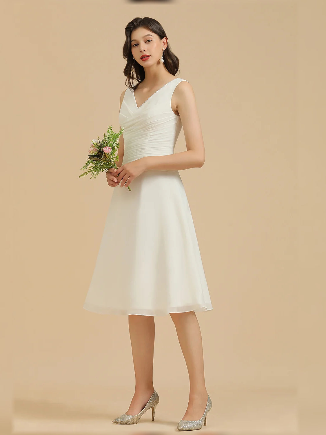 White ruched V-neck A-line mini chiffon dress with bouquet, full body