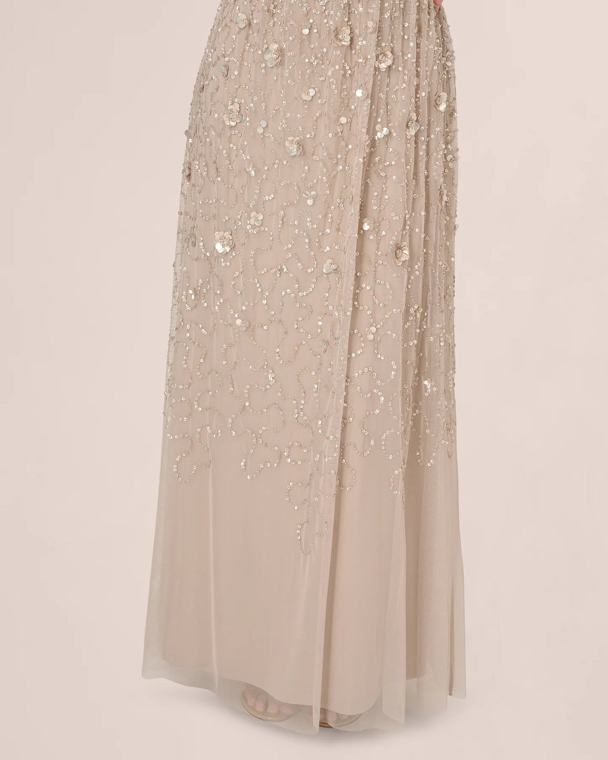 Silver maxi skirt with all-over sequined bead pattern and sheer tulle hem panel
