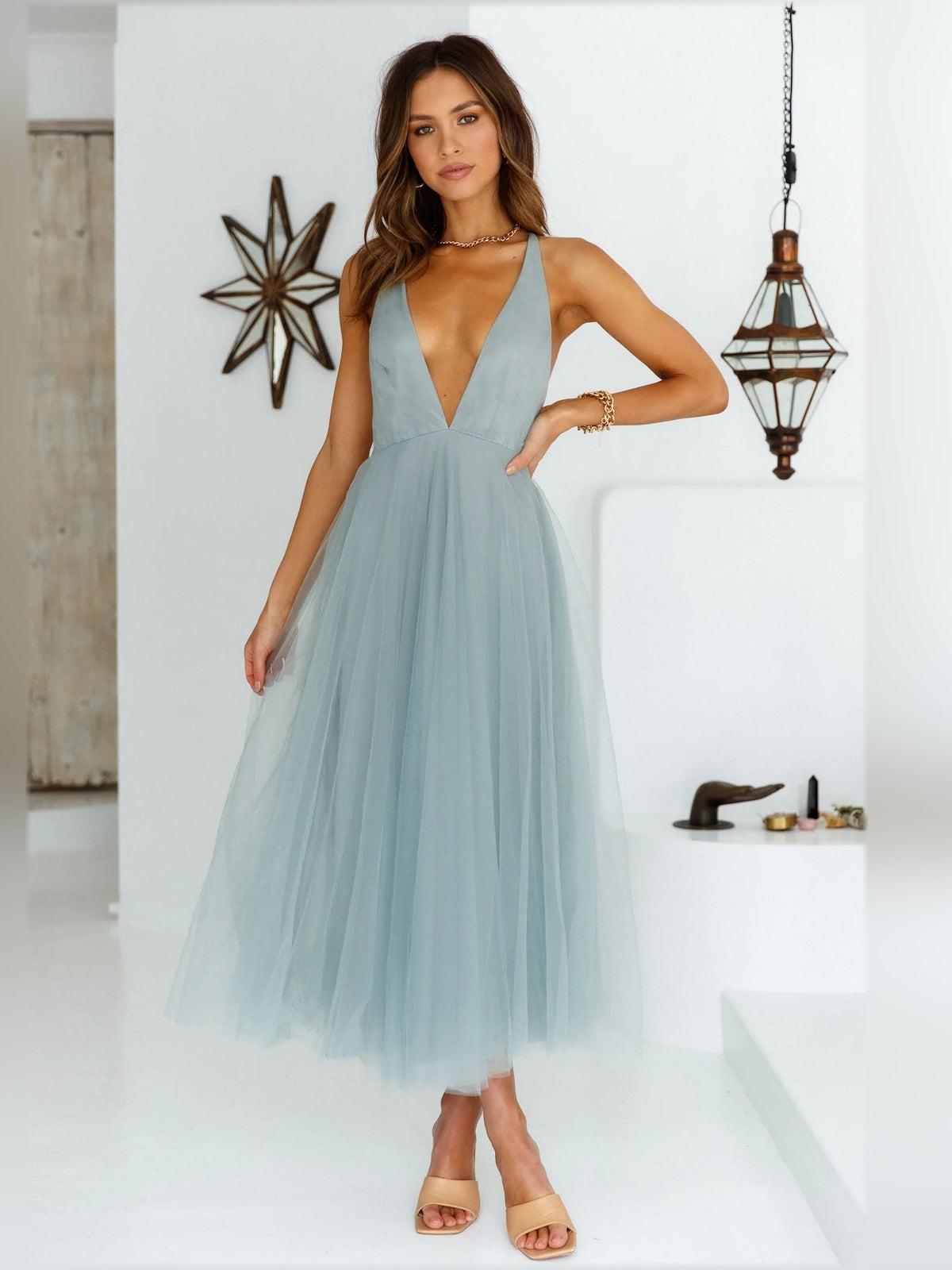 Sage midi formal dress with deep V neckline and sleeveless bodice, tiered tulle