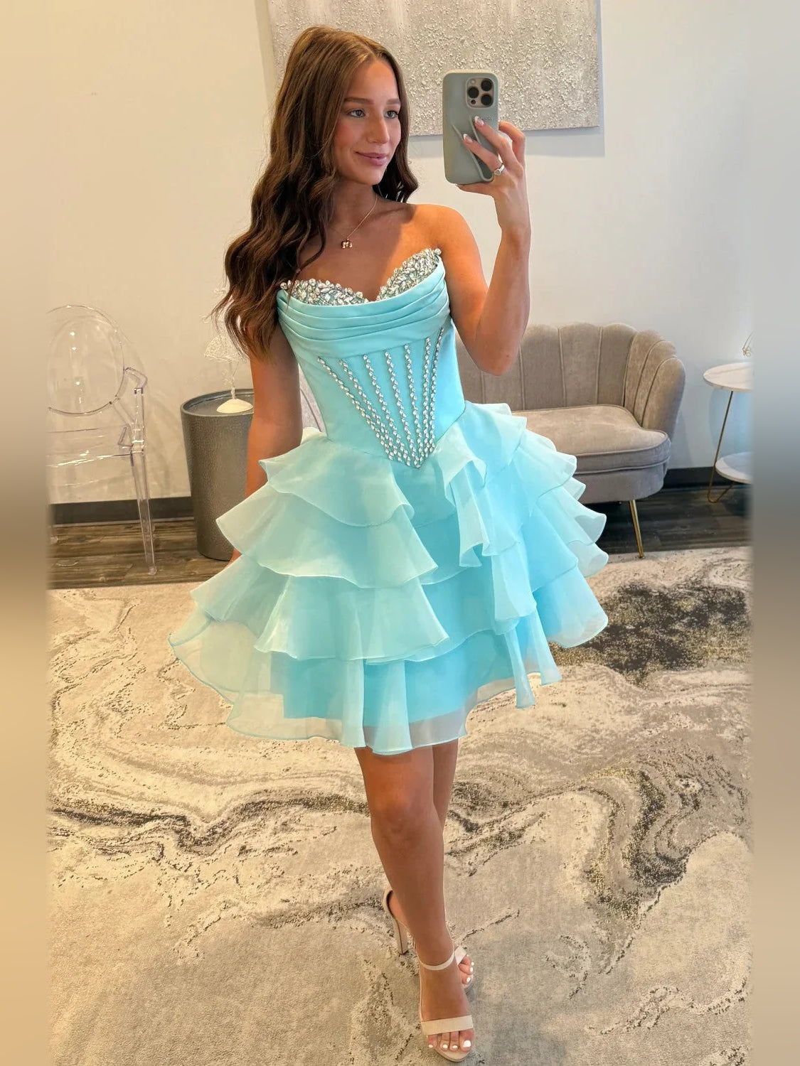 Ice blue sweetheart corset mini dress with layered ruffle skirt and jeweled trim