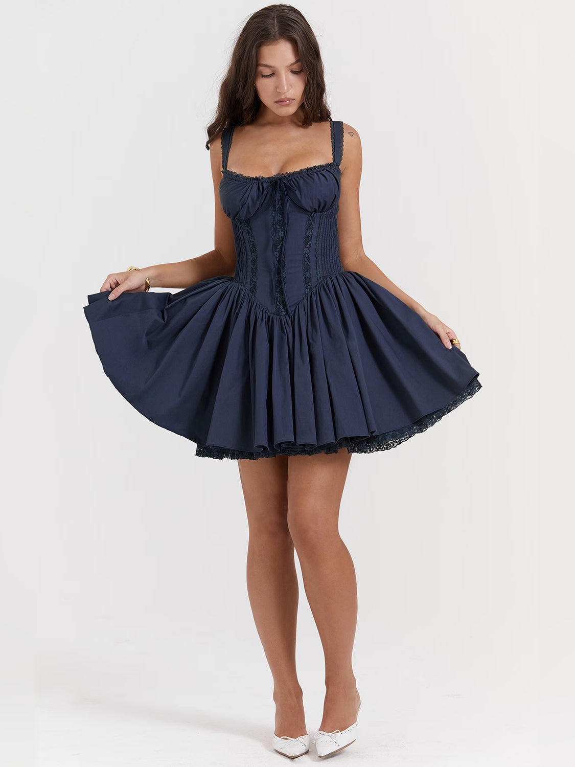 Navy corset mini dress with spaghetti straps and gathered sweetheart bodice, tiered skirt