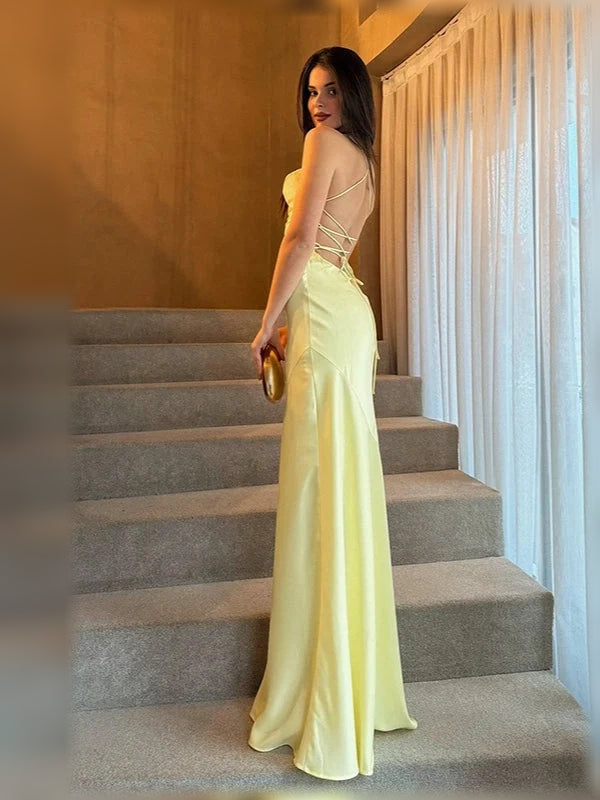 Pale yellow cowl-neck corset formal maxi dress with spaghetti straps
