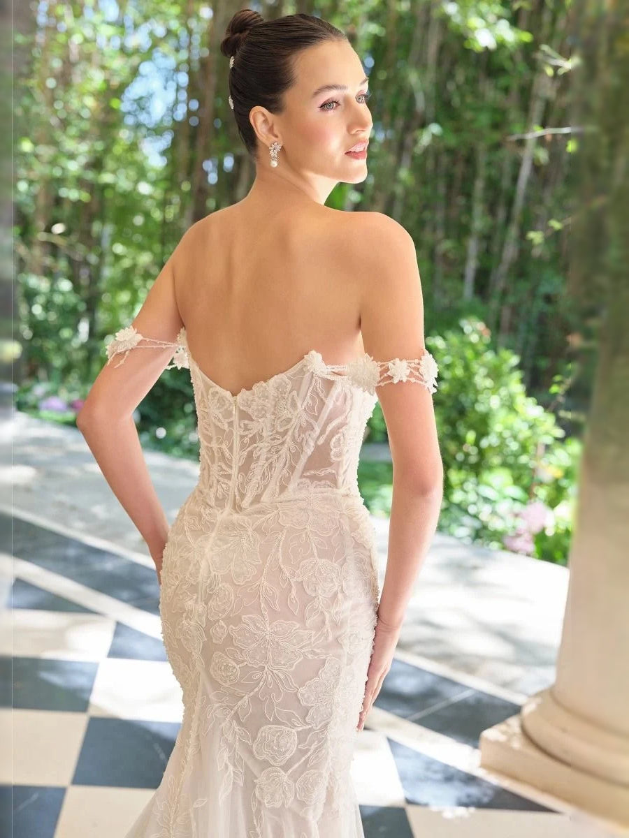 Ivory corset-style wedding dress with sheer lace back, off-shoulder sleeves, mermaid silhouette
