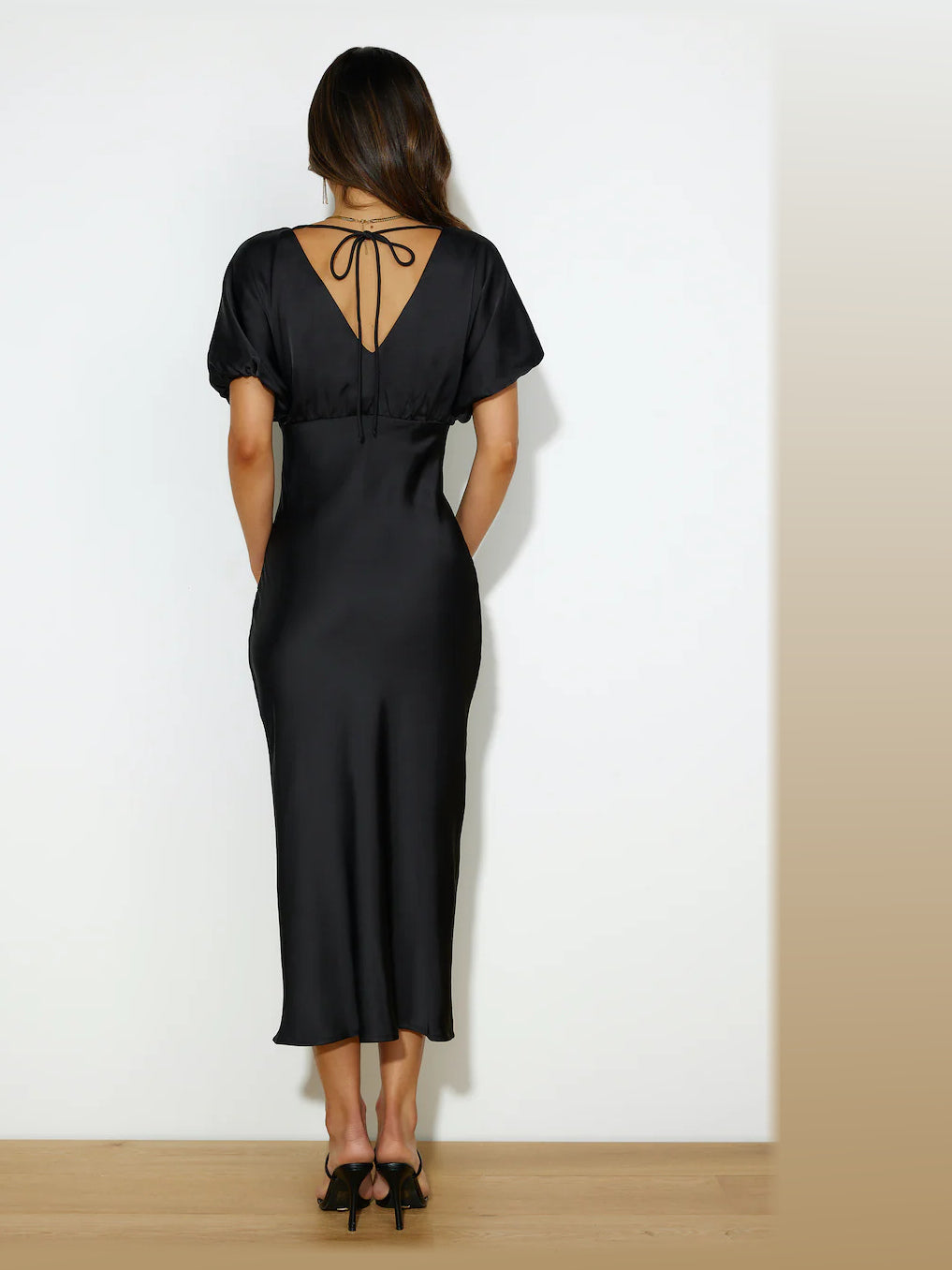 Black formal dress with a-line detailing