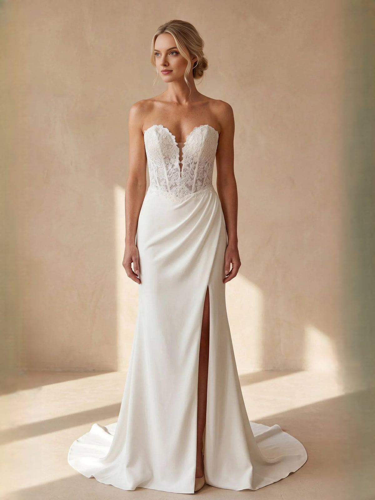 Ivory strapless sweetheart mermaid wedding dress with lace bodice and front slit skirt