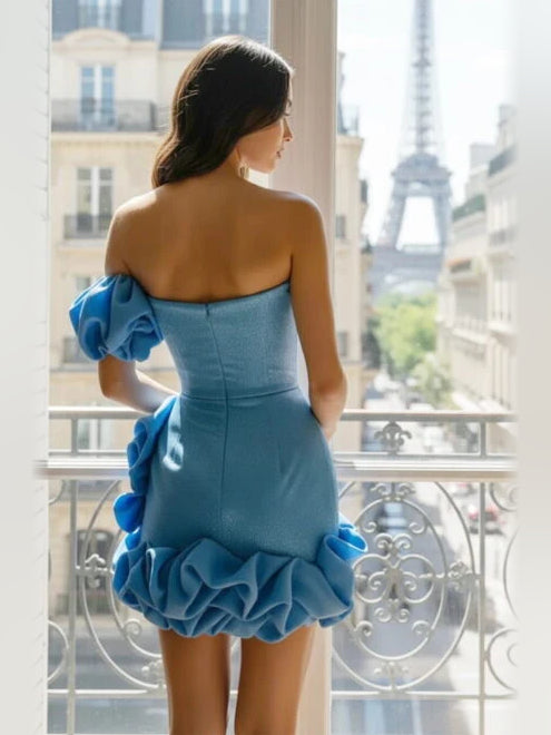 Back view of ruffled strapless mini bodycon dress in blue satin with puff sleeves