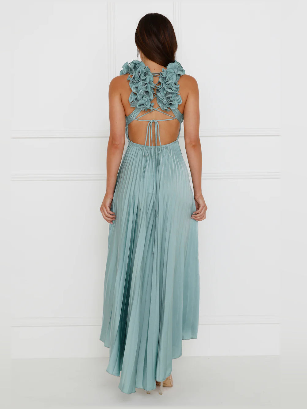 Sage satin midi formal dress back view with open back and ruffled strap detailing