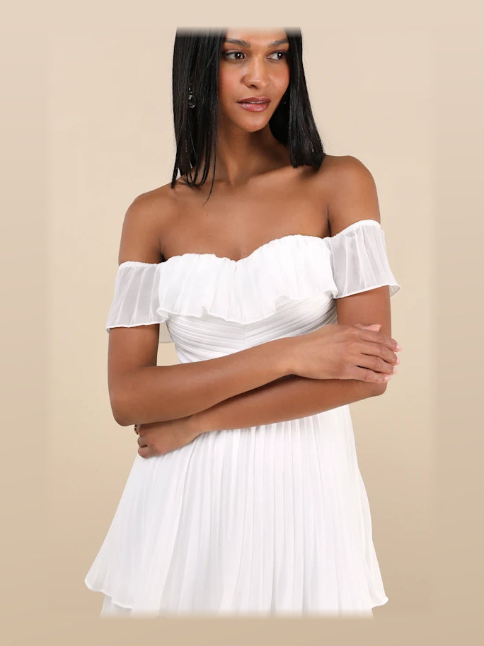 White formal dress with pleated detailing